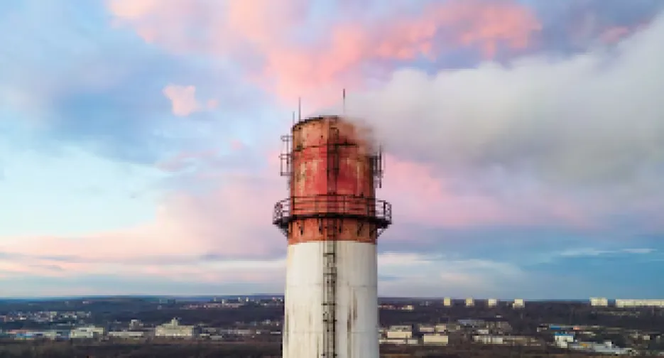 aerial-drone-view-thermal-station-sunset-with-smoke-coming-out-tube_1268-16964
